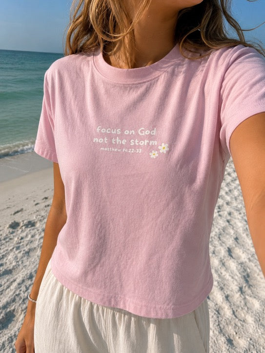 focus on God not the storm baby tee
