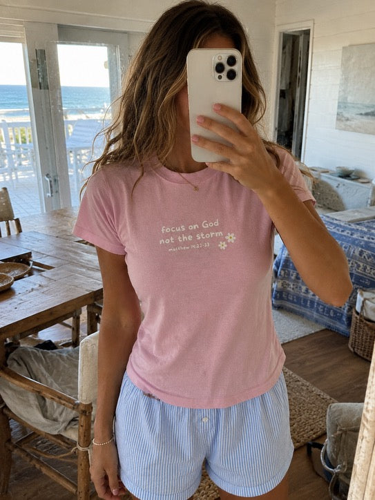 focus on God not the storm baby tee