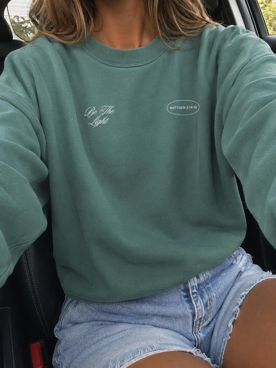 be the light lighthouse coastal crewneck