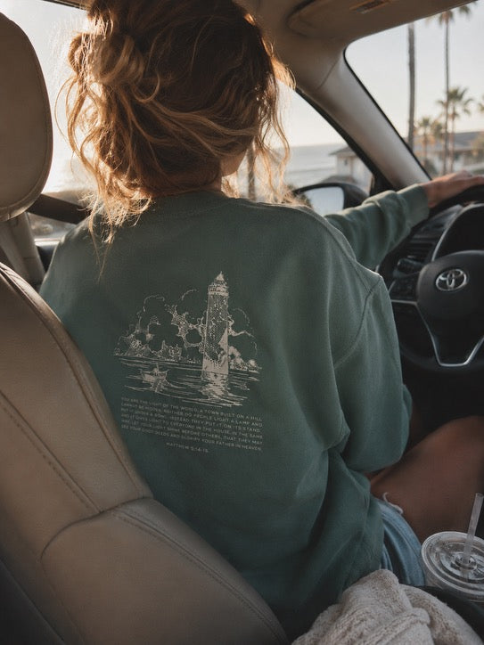 be the light lighthouse coastal crewneck
